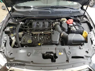 2017 Ford Taurus Limited z VIN 1FAHP2F81HG111818, wystawiony jako Copart lot #50169665 z przebiegiem 122 018 mil mil oraz Szkoda całkowita • Salvage title. Historia ofert i sprzedaży dostępna na DreamBid. Obrazek 11.