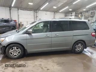 2006 Honda Odyssey EX with VIN 5FNRL38446B044231, listed as a IAAI auction lot 42080586 with 211,908 mi miles. Bid and sale history available at carsss.com. Image 14.