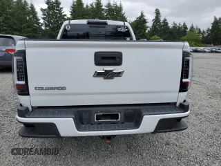 2018 Chevrolet Colorado 4WD Z71 with VIN 1GCPTDE11J1140908, listed as a Copart auction lot 59673205 with 104,799 mi miles and Clean title. Bid and sale history available at DreamBid. Image 6.