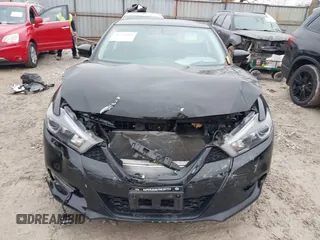 2018 Nissan Maxima SV with VIN 1N4AA6AP5JC387845, listed as a IAAI auction lot 41574505 with 50,629 mi miles and . Bid and sale history available at DreamBid. Image 12.