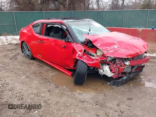 2015 Scion tC z VIN JTKJF5C79FJ013303, wystawiony jako IAAI lot #41581714 z przebiegiem Nie podano mil oraz . Historia ofert i sprzedaży dostępna na DreamBid. Obrazek 1.