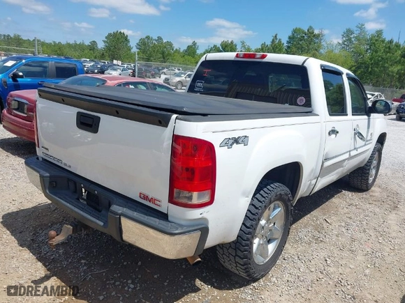 2012 GMC Sierra 1500 SLE with VIN 3GTP2VE73CG121892, listed as a IAAI auction lot 42028459 with 202,598 mi miles. Bid and sale history available at carsss.com. Image 4.