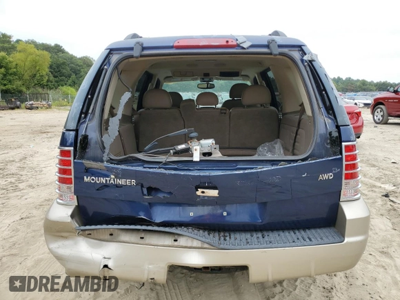 2004 Mercury Mountaineer Convenience z VIN 4M2ZU86K44ZJ49011, wystawiony jako Copart lot #69615444 z przebiegiem 135 702 mil mil oraz Szkoda całkowita • Salvage title. Historia ofert i sprzedaży dostępna na DreamBid. Obrazek 6.