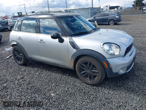 2014 MINI Countryman S with VIN WMWZC3C56EWP26003, listed as a IAAI auction lot 41884630 with 101,683 mi miles and . Bid and sale history available at DreamBid. Image 1.