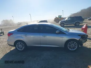 2016 Ford Focus SE with VIN 1FADP3F27GL390830, listed as a IAAI auction lot 41665012 with 119,673 mi miles. Bid and sale history available at carsss.com. Image 13.