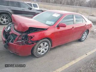 2007 Toyota Camry CE with VIN 4T1BE46K77U150924, listed as a IAAI auction lot 41798592 with 130,696 mi miles. Bid and sale history available at carsss.com. Image 2.