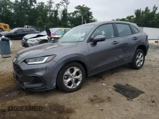 2023 Honda HR-V LX z VIN 3CZRZ2H32PM704516, wystawiony jako Copart lot #62423595 z przebiegiem 12 451 mil mil oraz Szkoda całkowita • Salvage title. Historia ofert i sprzedaży dostępna na DreamBid. Obrazek 1.