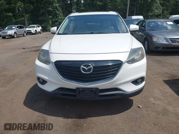 2014 Mazda CX-9 Touring z VIN JM3TB3CV7E0426900, wystawiony jako IAAI lot #42796725 z przebiegiem Nie podano mil oraz . Historia ofert i sprzedaży dostępna na DreamBid. Obrazek 12.