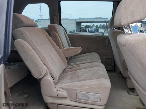 2001 Mazda MPV DX with VIN JM3LW28GX10193811, listed as a Copart auction lot 89283165 with 105,077 mi miles and Salvage Title. Bid and sale history available at carsss.com. Image 12.