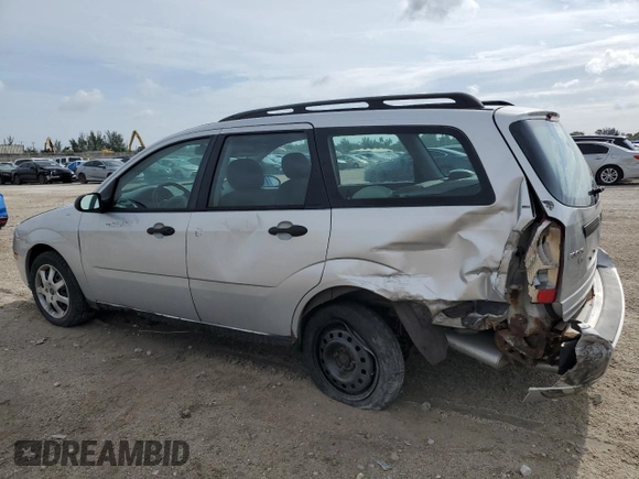 2005 Ford Focus SE with VIN 1FAFP36N75W299099, listed as a Copart auction lot 51410635 with 160,652 mi miles and Salvage Title. Bid and sale history available at carsss.com. Image 2.