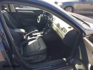 2014 Volkswagen Passat TDI SE w/Sunroof with VIN 1VWBN7A30EC055207, listed as a IAAI auction lot 41893637 with 133,074 mi miles. Bid and sale history available at carsss.com. Image 5.