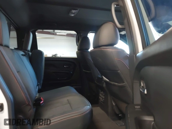 2024 Nissan Titan Pro-4X with VIN 1N6AA1ED0RN112314, listed as a IAAI auction lot 42465520 with 8,711 mi miles and . Bid and sale history available at DreamBid. Image 8.