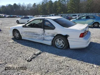 1997 Ford Thunderbird LX with VIN 1FALP62W0VH150654, listed as a Copart auction lot 86274524 with 119,203 mi miles and Salvage Title. Bid and sale history available at DreamBid. Image 2.