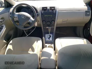 2010 Toyota Corolla with VIN 1NXBU4EE2AZ275061, listed as a Copart auction lot 52596765 with 113,833 mi miles and Salvage Title. Bid and sale history available at DreamBid. Image 8.