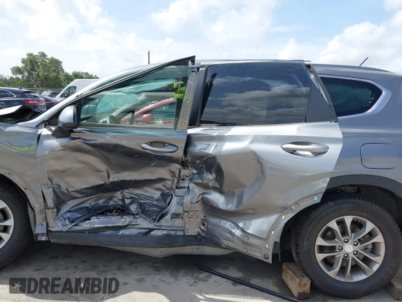 2019 Hyundai Santa Fe SE with VIN 5NMS23AD2KH108936, listed as a IAAI auction lot 42626196 with 72,757 mi miles and . Bid and sale history available at DreamBid. Image 14.