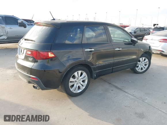2010 Acura RDX with VIN 5J8TB2H29AA001038, listed as a IAAI auction lot 41235246 with 158,991 mi miles. Bid and sale history available at carsss.com. Image 4.