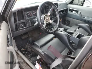 1988 Jeep Grand Cherokee z VIN 1JCMT7895JT247338, wystawiony jako Copart lot #83615234 z przebiegiem 185 676 mil mil oraz Szkoda całkowita • Salvage title. Historia ofert i sprzedaży dostępna na DreamBid. Obrazek 8.