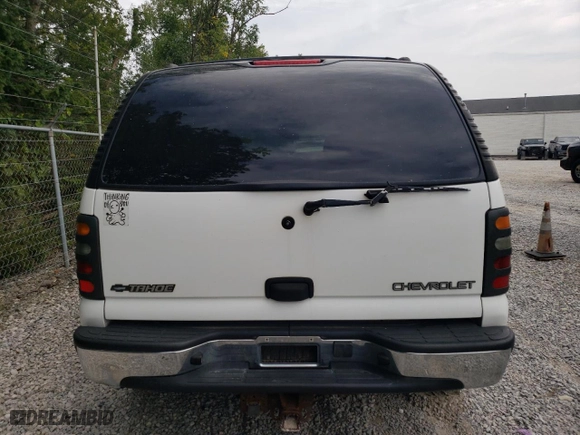 2002 Chevrolet Tahoe LS with VIN 1GNEK13Z62R330120, listed as a Copart auction lot 69304174 with 159,295 mi miles and Salvage Title. Bid and sale history available at carsss.com. Image 6.