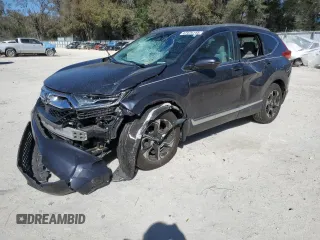 2017 Honda CR-V Touring with VIN 5J6RW1H96HL011555, listed as a Copart auction lot 47476145 with 74,087 mi miles and Salvage Title. Bid and sale history available at carsss.com. Image 1.