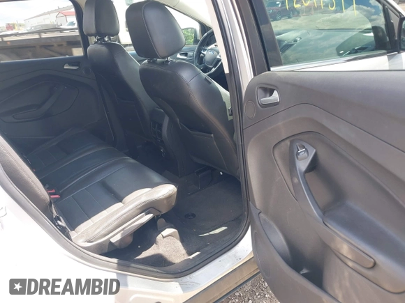 2013 Ford Escape SEL z VIN 1FMCU9H94DUD19842, wystawiony jako IAAI lot #42399577 z przebiegiem 176 257 mil mil oraz . Historia ofert i sprzedaży dostępna na DreamBid. Obrazek 8.