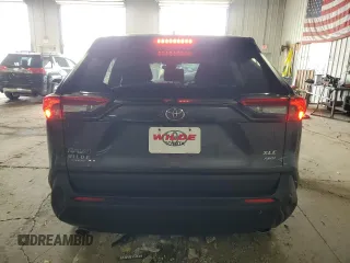 2023 Toyota RAV4 XLE with VIN 2T3P1RFV4PC330699, listed as a Copart auction lot 60452155 with 31,424 mi miles and Salvage title. Bid and sale history available at DreamBid. Image 6.