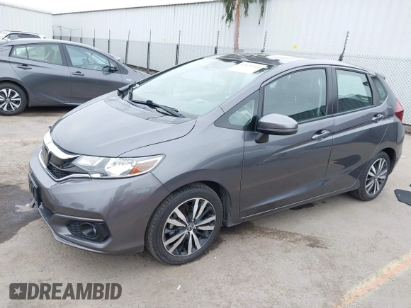 2018 Honda Fit EX with VIN 3HGGK5H85JM704873, listed as a IAAI auction lot 42421049 with 58,481 mi miles and . Bid and sale history available at DreamBid. Image 2.