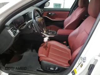 2022 BMW 3 Series 330i xDrive with VIN 3MW5R7J01N8C78063, listed as a Copart auction lot 55321055 with 22,797 mi miles and Salvage title. Bid and sale history available at DreamBid. Image 7.