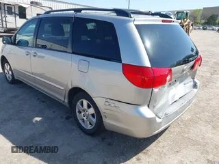 2009 Toyota Sienna CE with VIN 5TDZK23C19S263613, listed as a IAAI auction lot 41983708 with 162,395 mi miles. Bid and sale history available at carsss.com. Image 3.