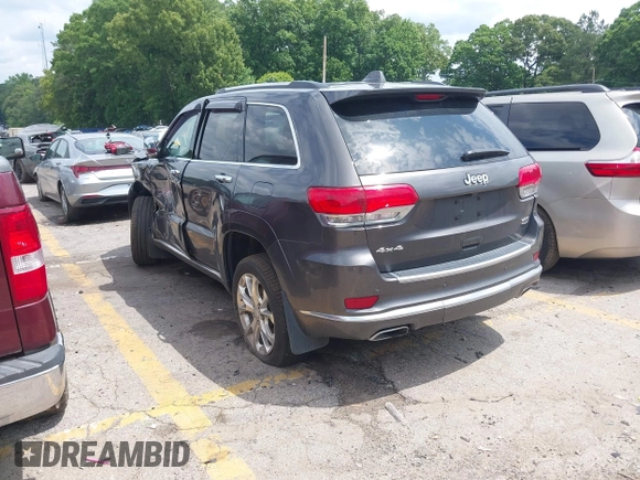 2020 Jeep Grand Cherokee Summit with VIN 1C4RJFJT0LC137054, listed as a IAAI auction lot 42235704 with 70,000 mi miles and . Bid and sale history available at DreamBid. Image 3.