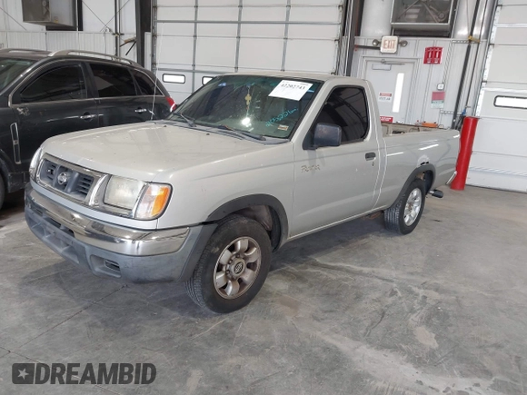 1998 Nissan Frontier XE with VIN 1N6DD21S9WC331083, listed as a IAAI auction lot 42202743 with 205,221 mi miles and . Bid and sale history available at DreamBid. Image 2.