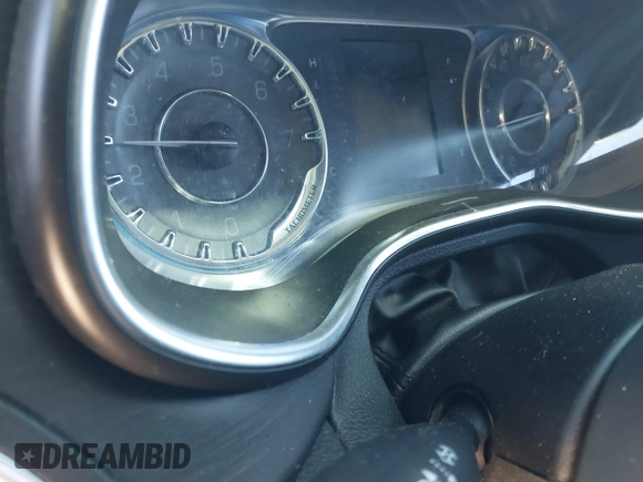 2016 Chrysler 200 Limited with VIN 1C3CCCAB7GN194677, listed as a IAAI auction lot 41609235 with Not Provided miles and . Bid and sale history available at DreamBid. Image 14.