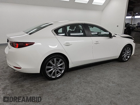 2025 Mazda 3 S Preferred with VIN JM1BPACM7S1761419, listed as a Copart auction lot 47939415 with 9,836 mi miles and Clean Title. Bid and sale history available at DreamBid. Image 3.