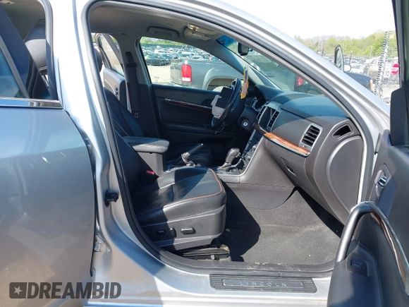2011 Lincoln MKZ with VIN 3LNHL2GC1BR754870, listed as a IAAI auction lot 42220451 with 143,922 mi miles and . Bid and sale history available at DreamBid. Image 5.
