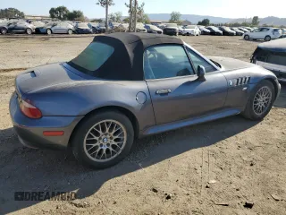 2000 BMW Z3 z VIN WBACH3345YLF71774, wystawiony jako Copart lot #75007354 z przebiegiem 170 924 mil mil oraz Szkody całkowita. Historia ofert i sprzedaży dostępna na DreamBid. Obrazek 3.
