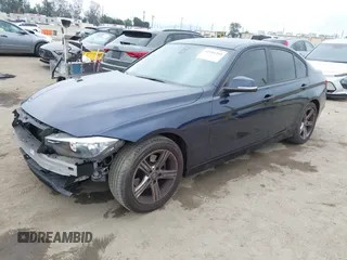 2014 BMW 3 Series 328i with VIN WBA3C1C56EK108665, listed as a IAAI auction lot 42101319 with 84,928 mi miles and . Bid and sale history available at DreamBid. Image 2.