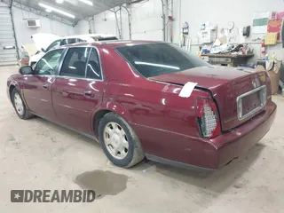2002 Cadillac DeVille with VIN 1G6KD54Y12U214732, listed as a IAAI auction lot 42018412 with 139,474 mi miles. Bid and sale history available at carsss.com. Image 3.