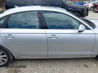 2015 Audi A6 Premium z VIN WAUCFAFC7FN034531, wystawiony jako IAAI lot #42172539 z przebiegiem 57 565 mil mil oraz . Historia ofert i sprzedaży dostępna na DreamBid. Obrazek 13.