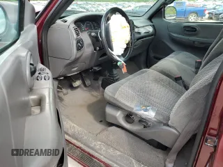 1999 Ford F-150 with VIN 1FTZF1823XNB69430, listed as a Copart auction lot 60218645 with Not provided miles and Salvage title. Bid and sale history available at DreamBid. Image 8.
