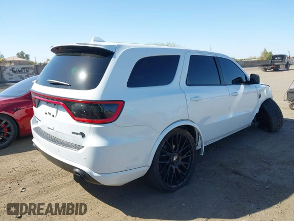 2021 Dodge Durango SRT Hellcat with VIN 1C4SDJH96MC692601, listed as a IAAI auction lot 41764490 with 27,434 mi miles and . Bid and sale history available at DreamBid. Image 4.