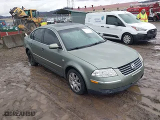 2002 Volkswagen Passat GLX with VIN WVWTH63B12P246104, listed as a IAAI auction lot 41577253 with 163,773 mi miles. Bid and sale history available at carsss.com. Image 1.