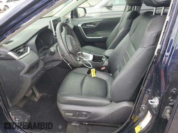 2023 Toyota RAV4 Hybrid XLE Premium with VIN JTMB6RFV2PD097428, listed as a Copart auction lot 52439575 with 13,955 mi miles and Salvage Title. Bid and sale history available at carsss.com. Image 7.