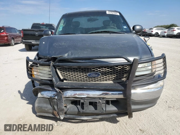2003 Ford F-150 XL with VIN 1FTRX17L33NB34789, listed as a Copart auction lot 73762304 with 0 mi miles and Salvage Title. Bid and sale history available at carsss.com. Image 5.