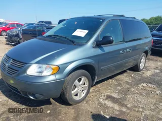 2005 Dodge Caravan SXT z VIN 2D4GP44LX5R581304, wystawiony jako IAAI lot #42709024 z przebiegiem 79 073 mil mil oraz . Historia ofert i sprzedaży dostępna na DreamBid. Obrazek 2.