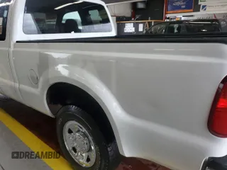 2009 Ford F-250 XL with VIN 1FTNX20529EA11705, listed as a IAAI auction lot 42793654 with 272,233 mi miles and . Bid and sale history available at DreamBid. Image 8.