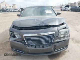 2013 Chrysler 300 with VIN 2C3CCABG7DH611105, listed as a IAAI auction lot 41769860 with 186,476 mi miles. Bid and sale history available at carsss.com. Image 12.