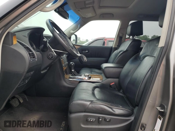 2012 Infiniti QX56 8-passenger with VIN JN8AZ2NC2C9317632, listed as a Copart auction lot 65179675 with 166,857 mi miles and Clean title. Bid and sale history available at DreamBid. Image 7.