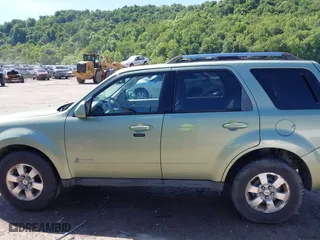 2009 Ford Escape Hybrid with VIN 1FMCU493X9KA56174, listed as a IAAI auction lot 39435925 with 158,171 mi miles. Bid and sale history available at carsss.com. Image 14.