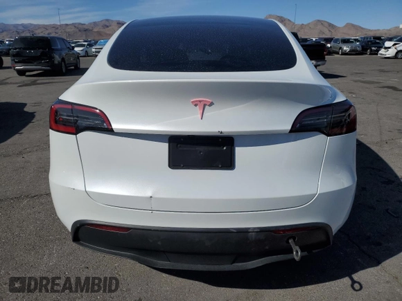 2025 Tesla Model Y Long Range with VIN 7SAYGDED2SA373756, listed as a Copart auction lot 49866835 with 3,318 mi miles and Salvage Title. Bid and sale history available at DreamBid. Image 6.
