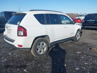2014 Jeep Compass Altitude with VIN 1C4NJCBA4ED775315, listed as a IAAI auction lot 41429259 with 148,064 mi miles. Bid and sale history available at carsss.com. Image 4.
