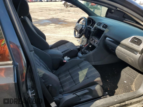 2012 Volkswagen GTI w/Conv & Sunroof с VIN WVWEV7AJ5CW145480, выставлен на аукционе Copart как лот 71466434 с пробегом Не указан миль и Списание • Salvage title. История ставок и продаж доступна на DreamBid. Изображение 10.
